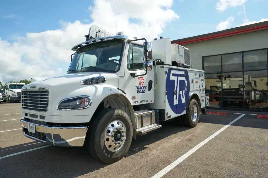 Tracey road service truck equipped for on-site heavy equipment repair