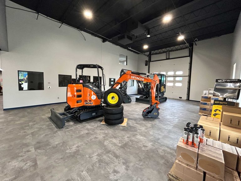 Construction equipment in modern showroom