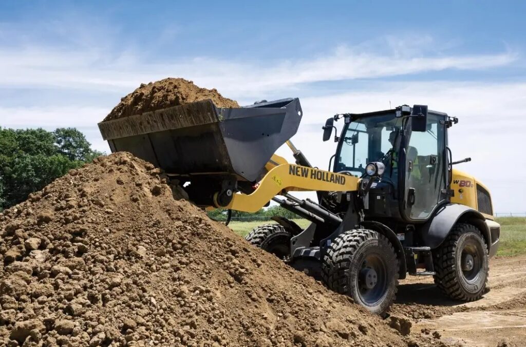 New holland compact wheel loaders: meet the new w70d, w80d and w80d long reach new holland compact wheel loaders w80d working